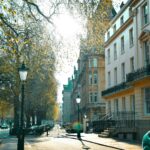 A sunny day in London's iconic streets, showcasing classic architecture.